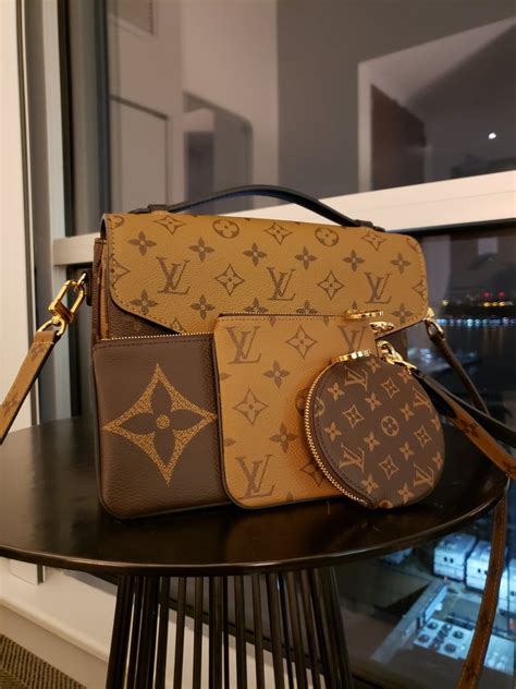 lv trio pouch